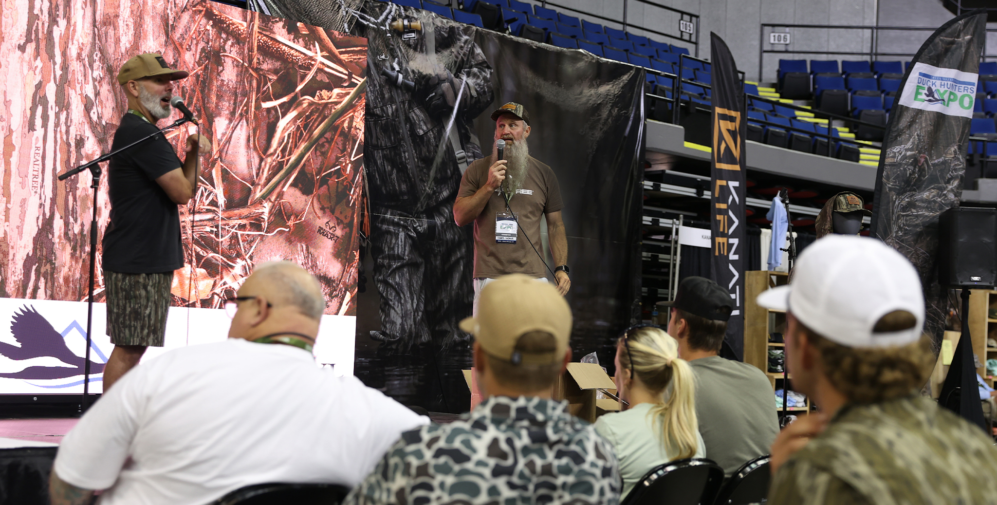 live stage at the Duck Hunters Expo with speakers and audience