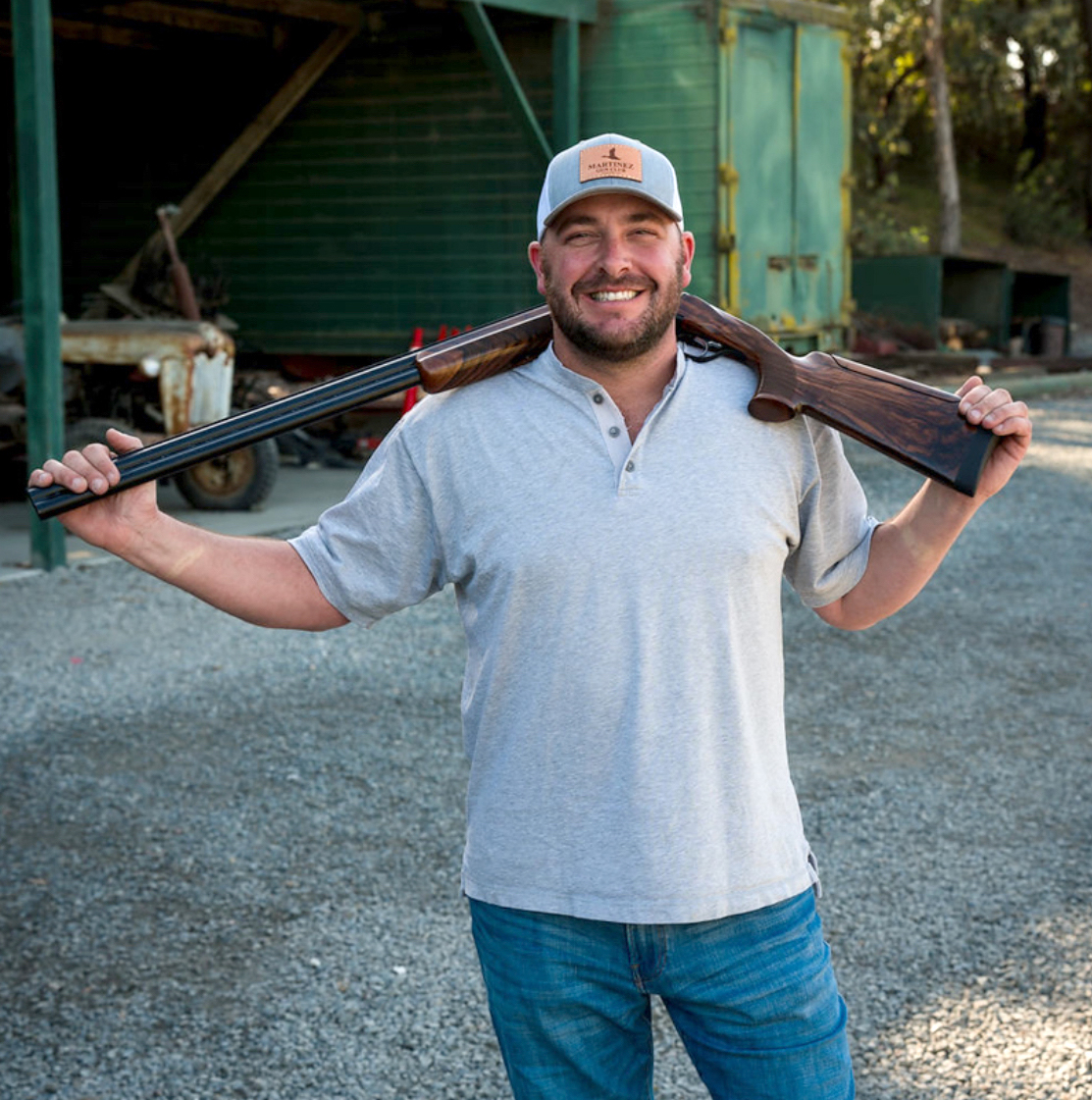 Blake Fahmie can be seen posing with a firearm on a farm.
